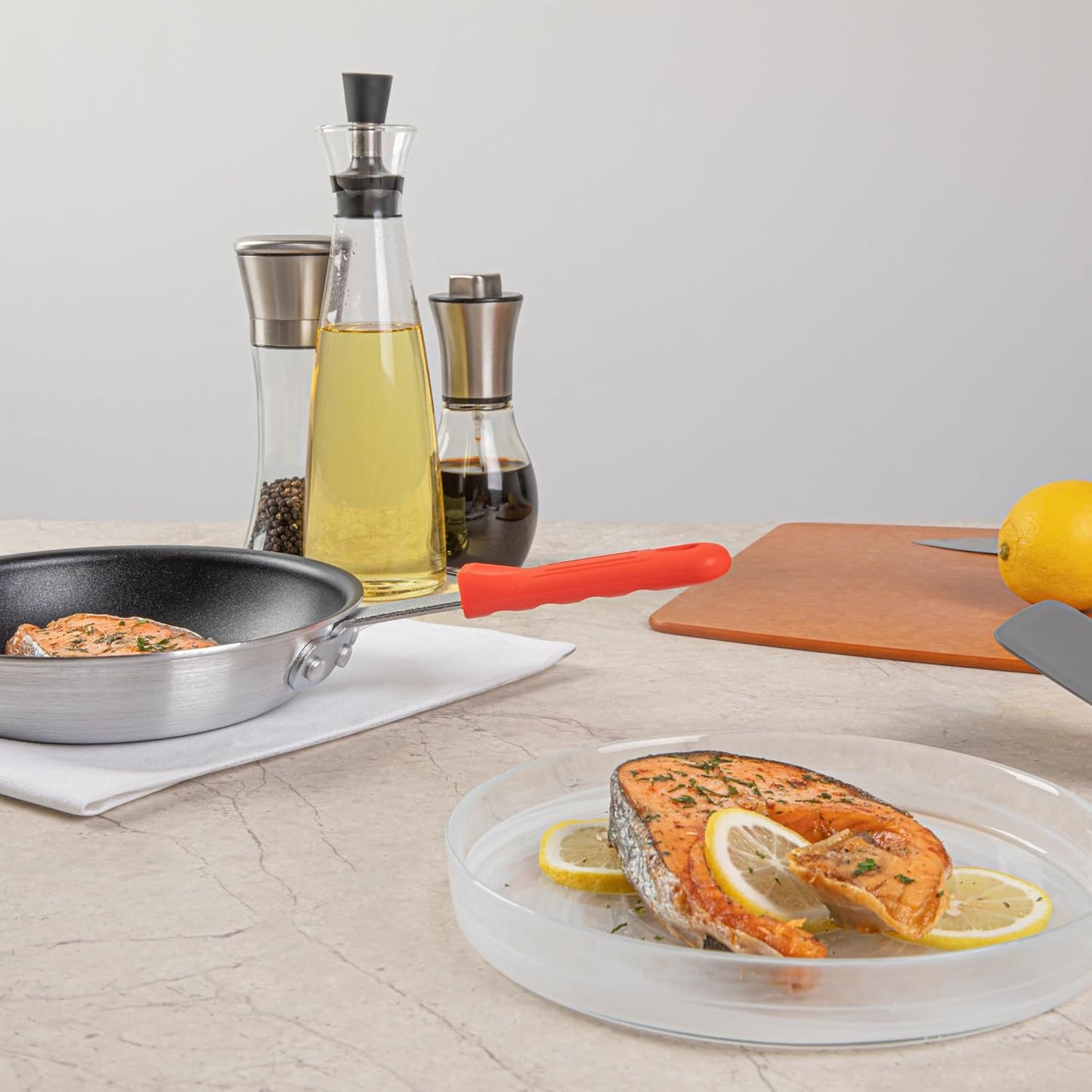 Restaurantware Pan Handle Sleeve 1 Pack Of 4.25" Removable Silicone Pot Handle Holder Fits 8-inch And 9-inch Pans No-Slip Heat-Resistant Dishwashable Red Aluminum Fry Pan Covers for Home Kitchen